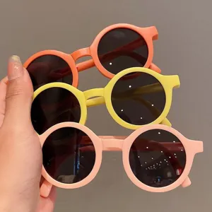 Süße runde Kindersonnenbrille in Bonbonfarben, modisches Accessoire für Babys und Kleinkinder