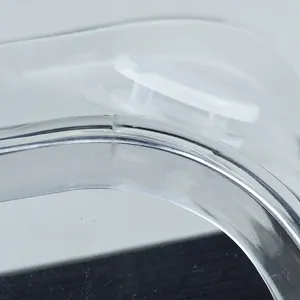 Macro close-up detail of the transparent anti-fog protective safety goggles frame