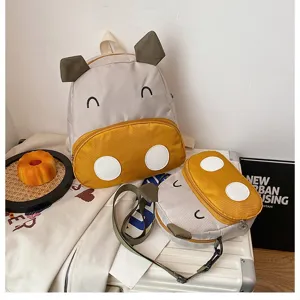 Niedlicher Cartoon Kuh Schulrucksack und Umhängetasche Set für Kinder und Schüler
