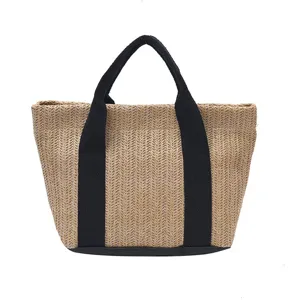 Bolso de paja trenzada con asas de lona negra para vacaciones de verano en playa