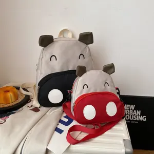 Süßes Cartoon-Kuh-Kinderrucksack und Umhängetaschen-Set für Kindergarten-Kinder
