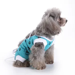 Breathable pet surgery recovery suit for dogs with cute paw print design and secure straps.