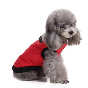 Close-up detail of a red quilted waterproof dog winter jacket for outdoor warmth.