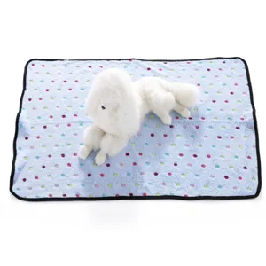 Detailed view of the soft double-sided fleece pet blanket with cute paw prints for dogs and cats.