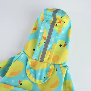 Cute pet dog raincoat with cute yellow duck pattern, hooded waterproof two-leg pet apparel.
