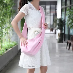 Pink pet sling carrier bag for small dogs, breathable crossbody pet travel bag for outdoor.