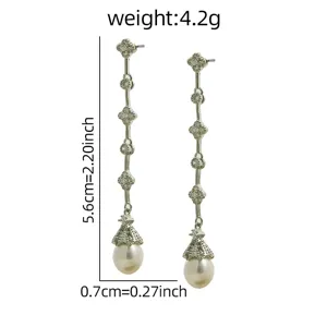 Elegantes pendientes de trébol en plata con circonitas y perlas blancas naturales