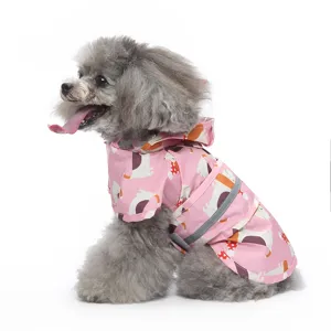 Pink hooded pet dog raincoat with cute cartoon patterns and reflective strip for outdoor walks.