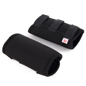Close-up of black neoprene dog joint protector with adjustable Velcro straps