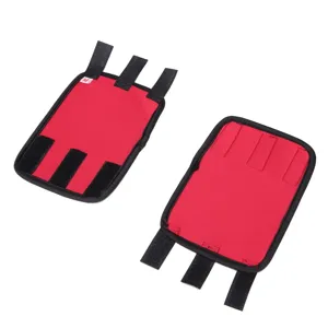 Detail view of red dog elbow protector with three adjustable black straps for joint support