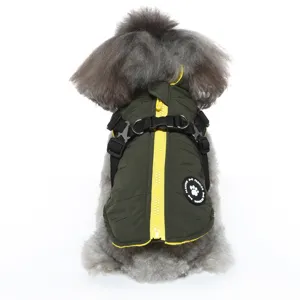 Insulated dark green winter dog jacket with integrated harness and yellow zipper closure
