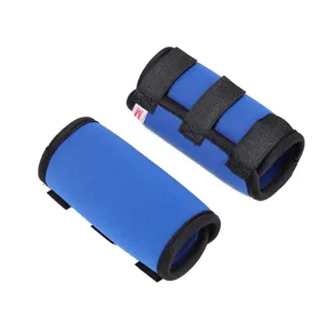 Close-up of blue dog leg braces with adjustable black Velcro straps for joint support