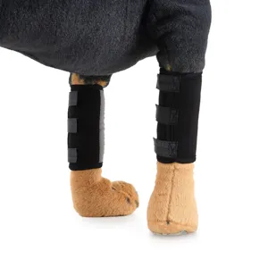 Close-up of black dog leg braces with adjustable straps on a clean white background