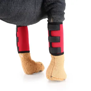 Detailed view of red pet leg brace with three adjustable black Velcro straps for dog support.