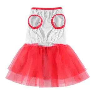 Pet summer dress detail view, white top with red trim and layered tutu mesh skirt.