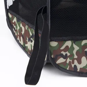 Detailed view of foldable pet tent featuring durable camo fabric and black mesh design.