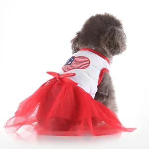 Cute dog summer dress with red mesh skirt and patriotic heart bow design for small pets.