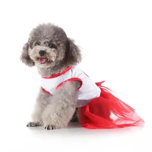 Detailed shot of cute pet dog wearing red and white summer dress tutu, soft fabric.