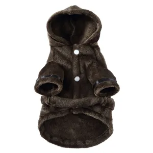 Detailed view of plush dark brown pet bathrobe with hood and white buttons