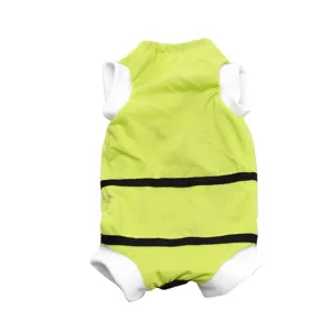 Close up detail of green pet surgery recovery suit with black stripes and white cuffs.