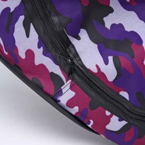 Close up detail view of purple camouflage pet tent fabric featuring a durable black zipper.