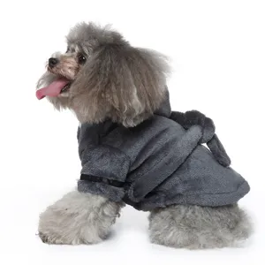 Plush grey dog bathrobe pajamas with tie-belt accessory worn by a poodle on white background.