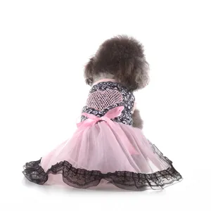 Pet summer dress detail view showing pink mesh heart, lace trim and bow knot design.