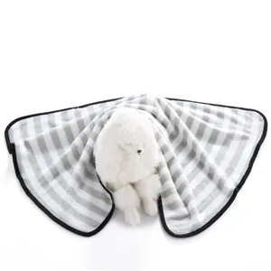 Cozy grey and white striped pet blanket with plush toy detail, soft fleece fabric for cats and dogs.