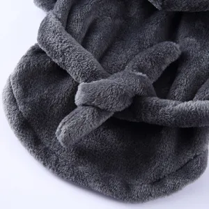 Close-up macro view of the soft plush fabric and belt detail on a grey pet bathrobe.