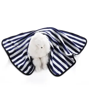 Detailed shot of the soft blue and white striped pet fleece blanket, cozy texture for cats and dogs.