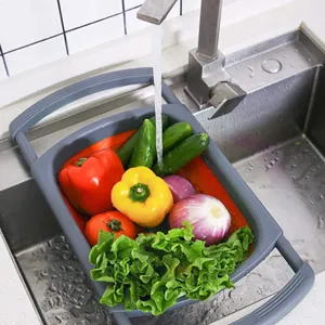 Collapsible telescopic sink drain basket for washing vegetables and fruits in grey and orange