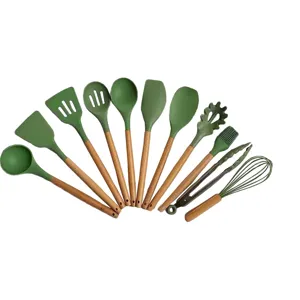 Green silicone kitchen utensil set with wooden handles, non-stick cookware cooking tools.