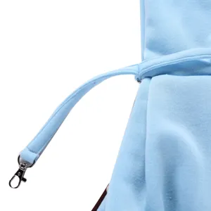 Close-up detail of the light blue pet bag shoulder strap with durable metal clasp hardware.