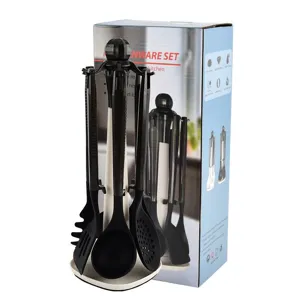 Juego de utensilios de cocina de silicona con soporte, ideal para sartenes antiadherentes.