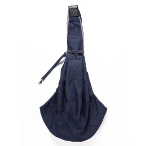 Detail shot of breathable denim pet sling carrier with secure buckle and adjustable shoulder strap.
