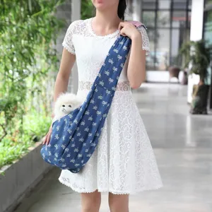 Breathable pet sling bag crossbody dog carrier outdoor portable pouch for small dogs and cats.