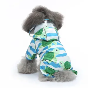 Joli imperméable pour chien à quatre pattes motif tortue avec capuche et bandes réfléchissantes.