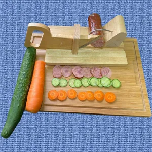 Detail of a manual wooden sausage slicer with stainless steel blade and food slices.