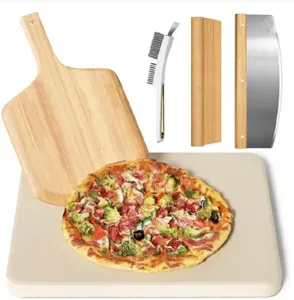 Detailed view of pizza stone set including wooden peel, rocker cutter, and cleaning brush
