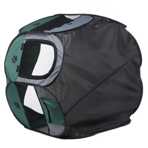 Foldable pet tent and playpen detail view featuring breathable mesh windows and green paw print design.