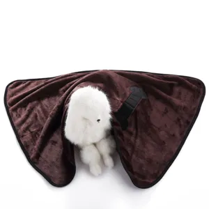 Detailed view of brown fleece pet blanket with black bone applique for dogs and cats comfort.