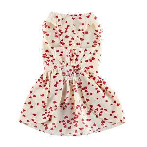 Red heart print pet dress detail, cute sleeveless dog summer clothes with ruffled skirt hem.