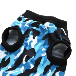 Detailed view of blue camouflage pet surgical suit with comfortable black ribbed collar cuffs.