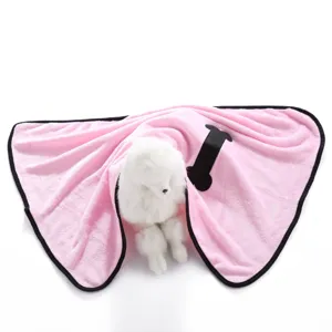 Pink pet blanket detail with black bone pattern and cozy double-sided fleece material.