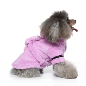 Soft pink plush pet bathrobe for dogs shown in a high-quality detail view