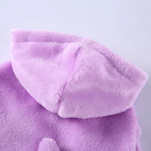 Macro detail of the soft purple plush hood and furry texture on this pet bathrobe for dogs