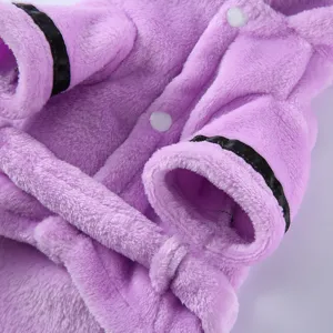 Macro detail of soft purple plush pet bathrobe featuring black satin trim on sleeves