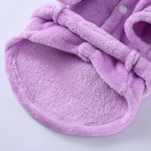 Close-up of soft purple plush pet bathrobe showing fuzzy texture and waist tie