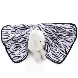 Soft zebra pattern pet blanket for dogs and cats, cozy double-sided plush mat for all seasons.