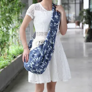 Blue camouflage breathable pet sling carrier bag for dogs, comfortable outdoor crossbody style.